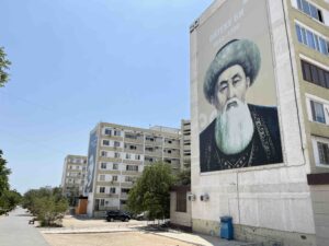 Mural on residential building showing Aiteke Bi Baibekuly