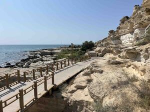 Trail along a rocky cliff, the Caspian Sea in the background